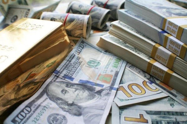 gold-bars-stacks-of-cash